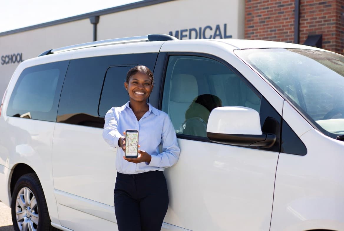 Professional driver with a clean passenger van